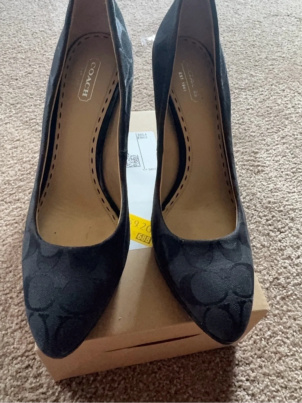 Coach Black Signature Canvas Pointed Toe Pumps, with Pattern leather detailing.